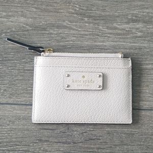 Kate Spade card and change holder cream colour